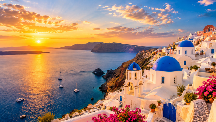 Sunset over a whitewashed caldera village